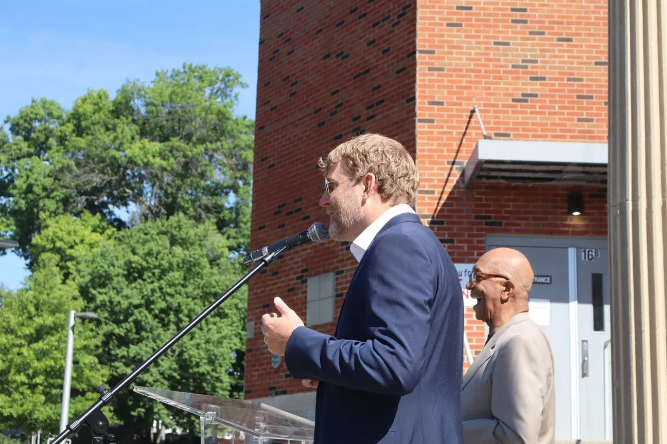 Stephen McCauley speaking at a school and community gathering