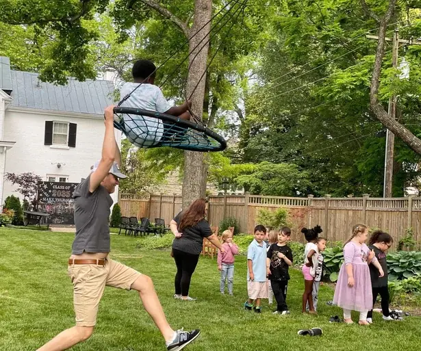 Stephen McCauley joining students during an outdoor activity